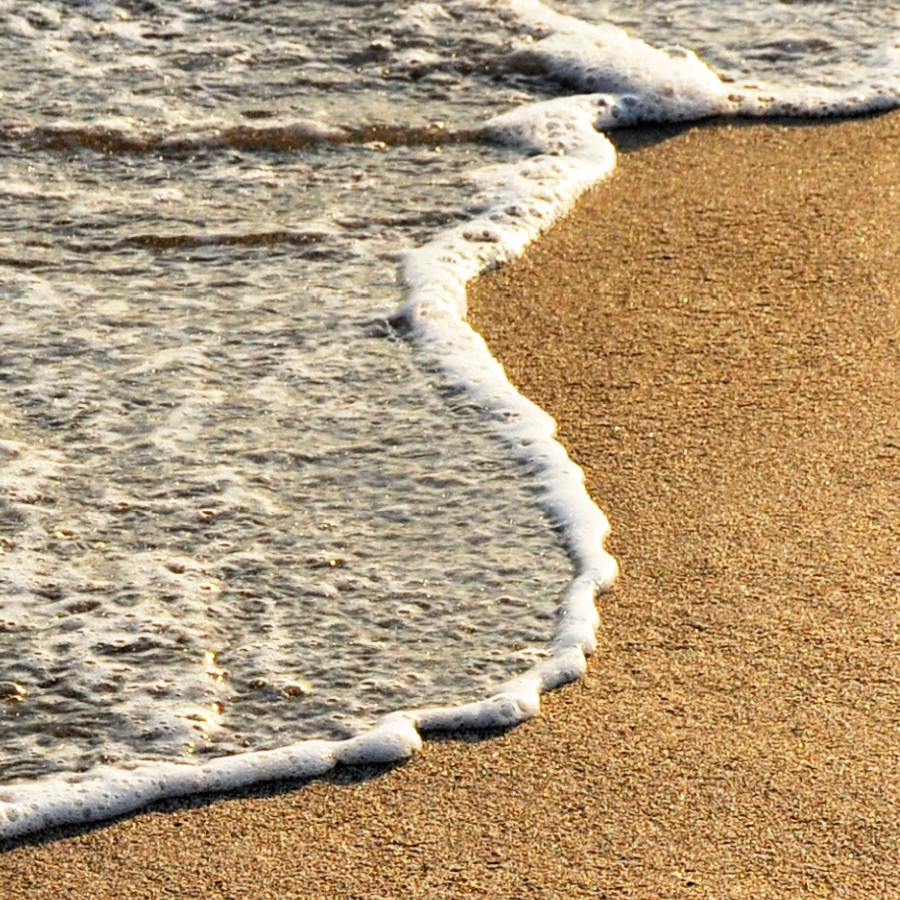 waves rolling onto the beach